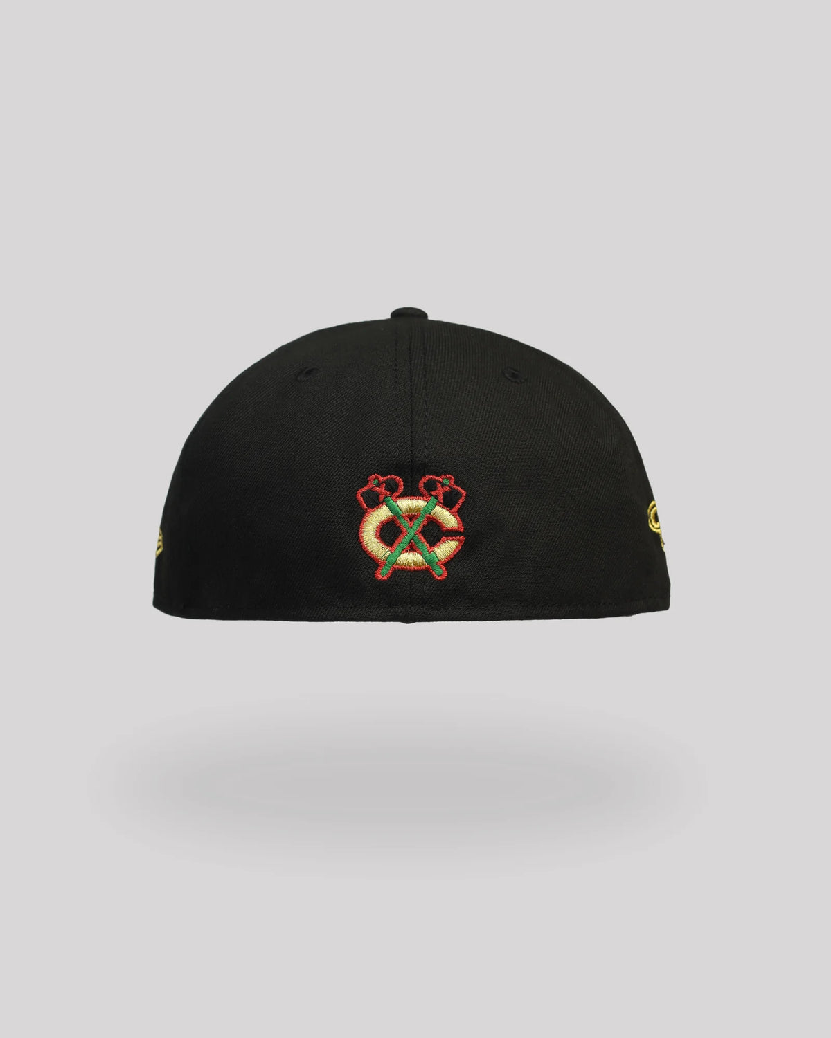 Gorra 59FIFTY Chicago Blackhawks 100th Anniversary – Negra / Dorado – vista trasera/lateral