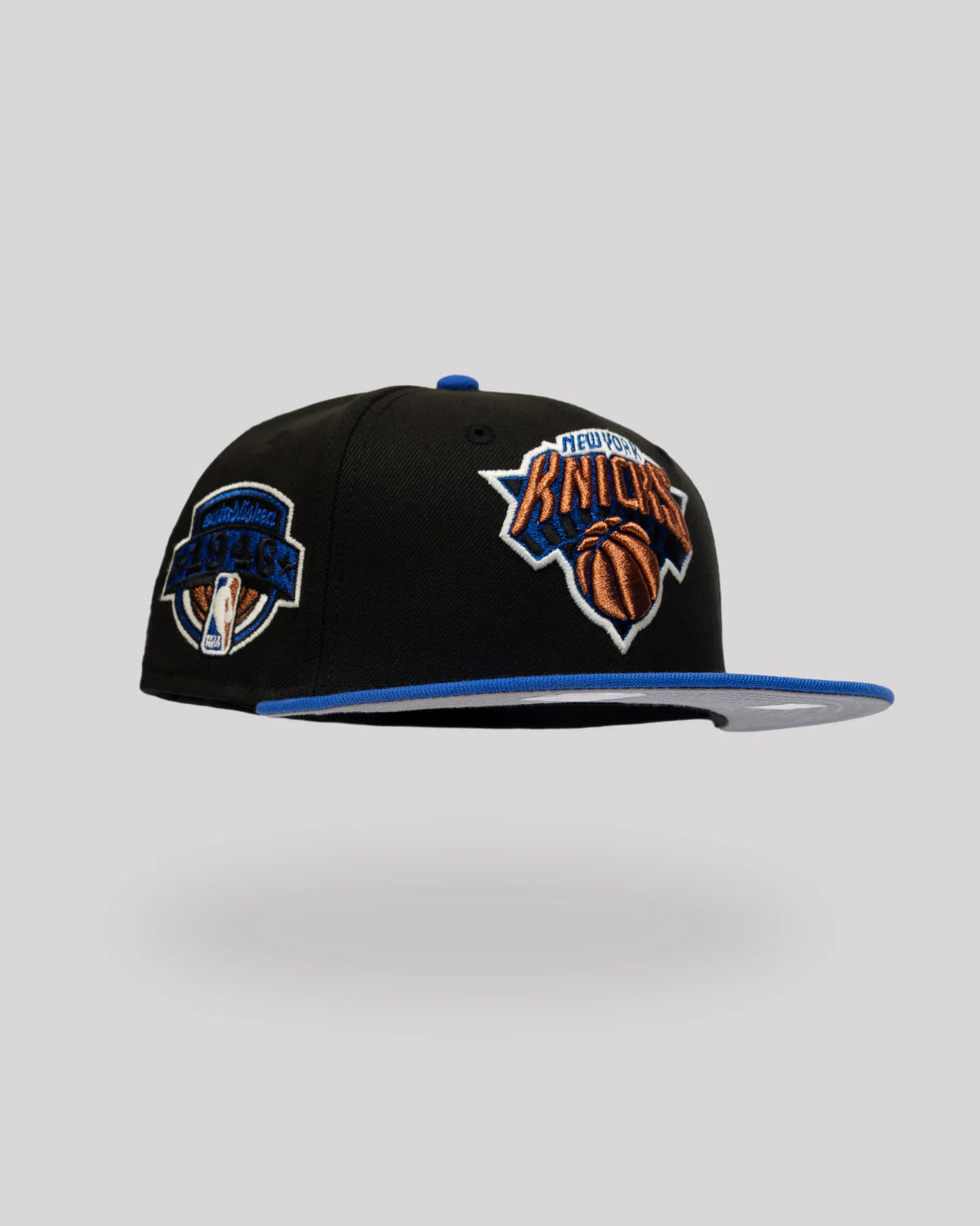 Gorra 59FIFTY New York Knicks Glow in the Dark – Negra / Azul Imagen principal del producto